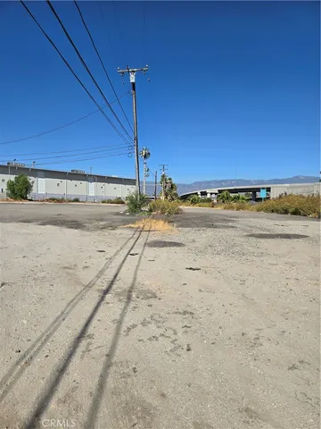 a view of a beach with a ocean view