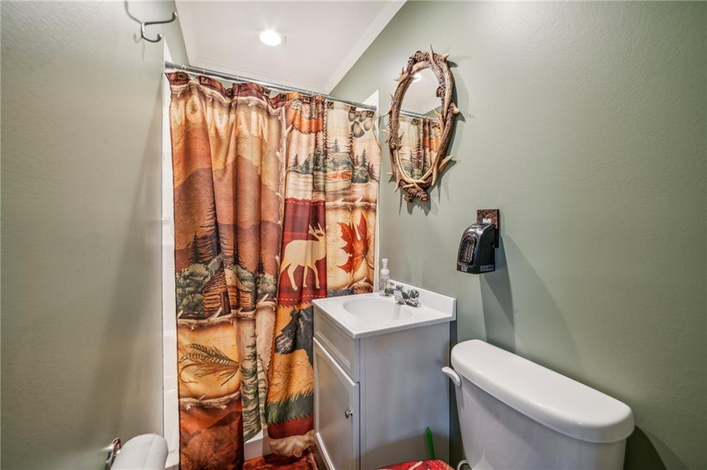 11401 McKee Road Irwin, PA 15642 - Photo 17 of 27 a bathroom with a sink toilet and shower