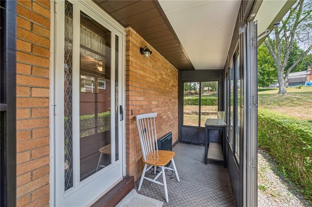 11401 McKee Road Irwin, PA 15642 - Photo 20 of 27 a balcony with chairs and table in balcony