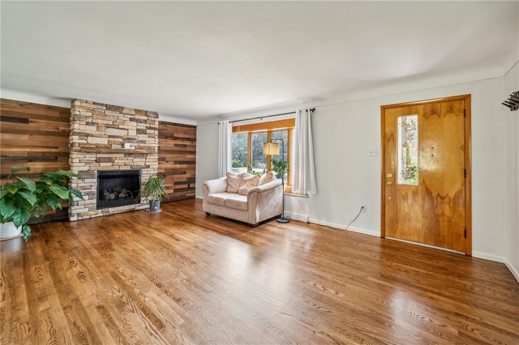 11401 McKee Road Irwin, PA 15642 - Photo 3 of 27 a living room with furniture and a fireplace