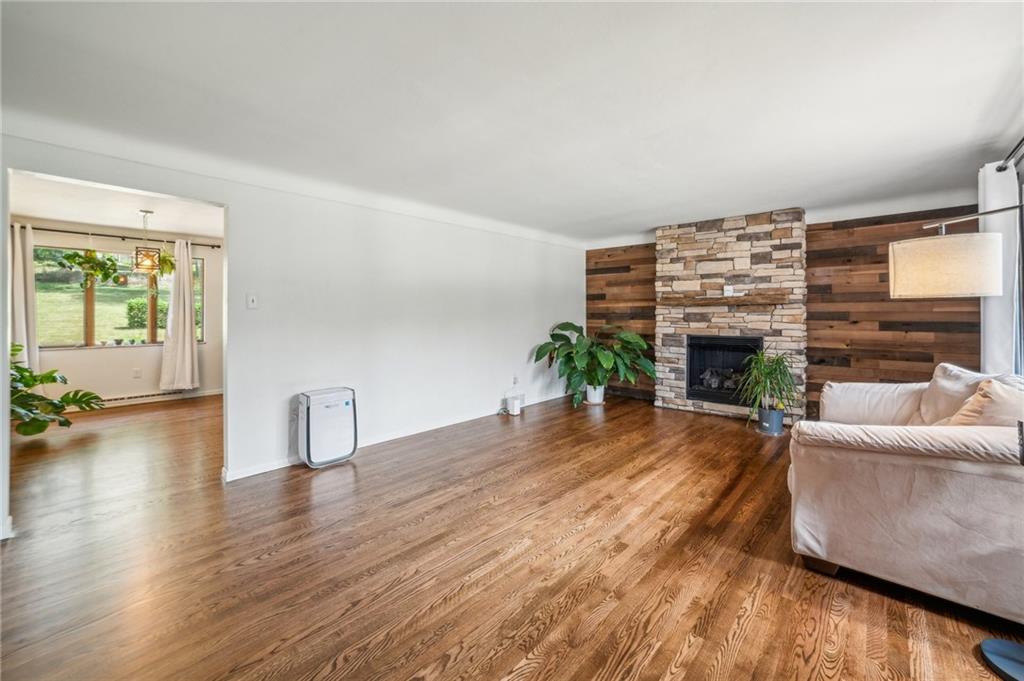 11401 McKee Road Irwin, PA 15642 - Photo 4 of 27 a living room with furniture and a fireplace