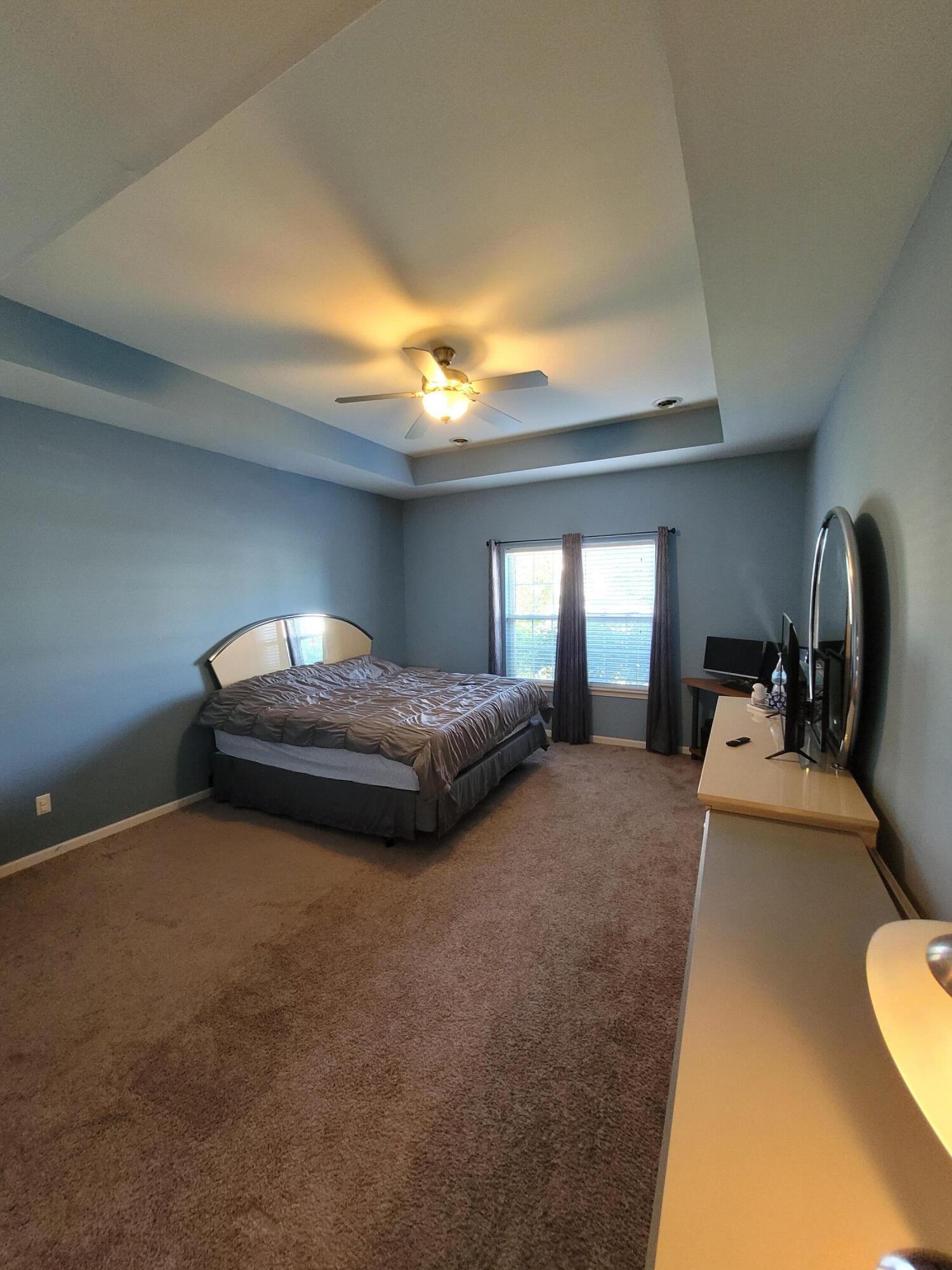 5480 Victoria Place Crown Point, IN 46307 - Photo 11 of 14 a bedroom with bed and window