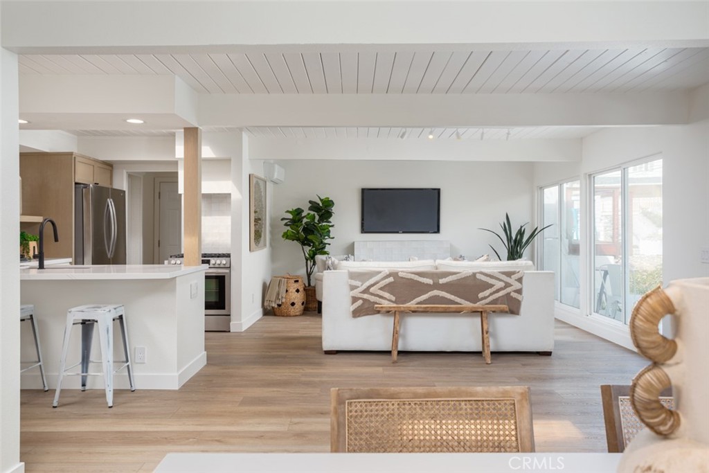 33961 Crystal Lantern Dana Point, CA 92629 - Photo 3 of 28 a living room with furniture and a fireplace