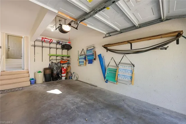 a view of a garage with red carpet
