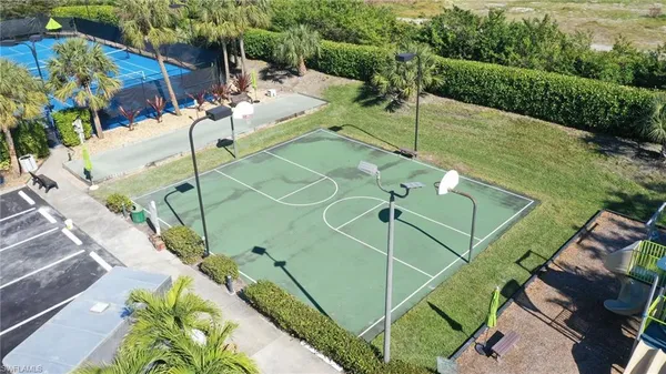 an aerial view of a house with a swimming pool