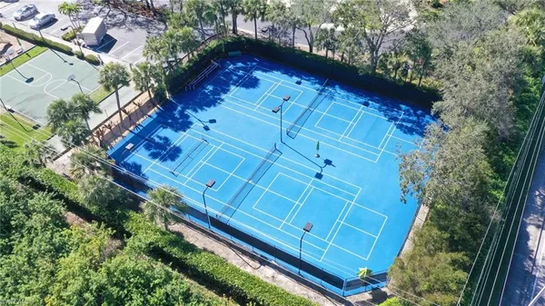 a room with gym equipment and a large window