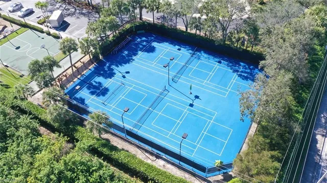 a room with gym equipment and a large window