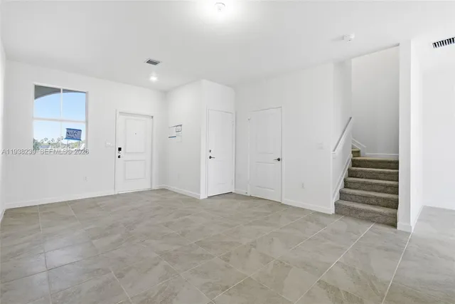 an empty room with a natural light