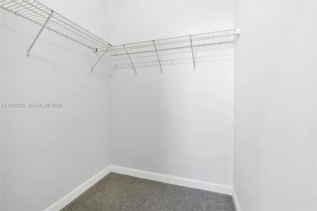 a view of a backyard with garden