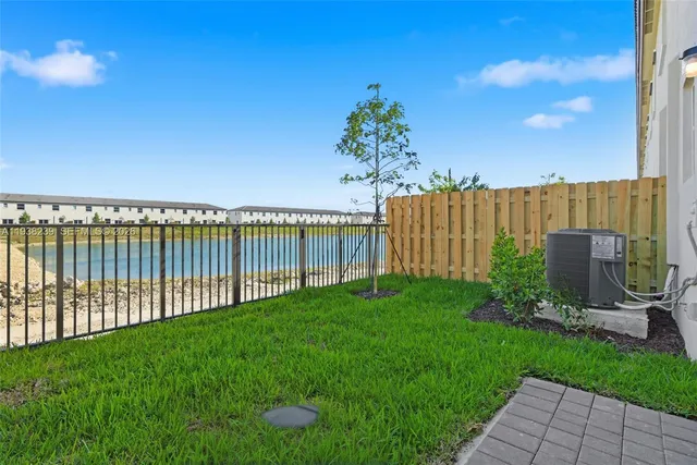 a view of a back yard of the house