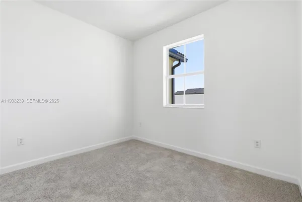 an empty room with a window
