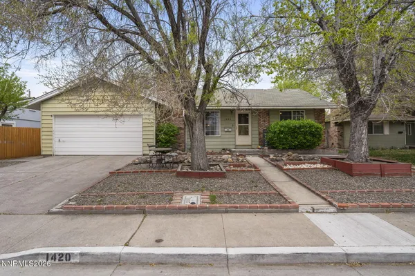 a front view of house with yard
