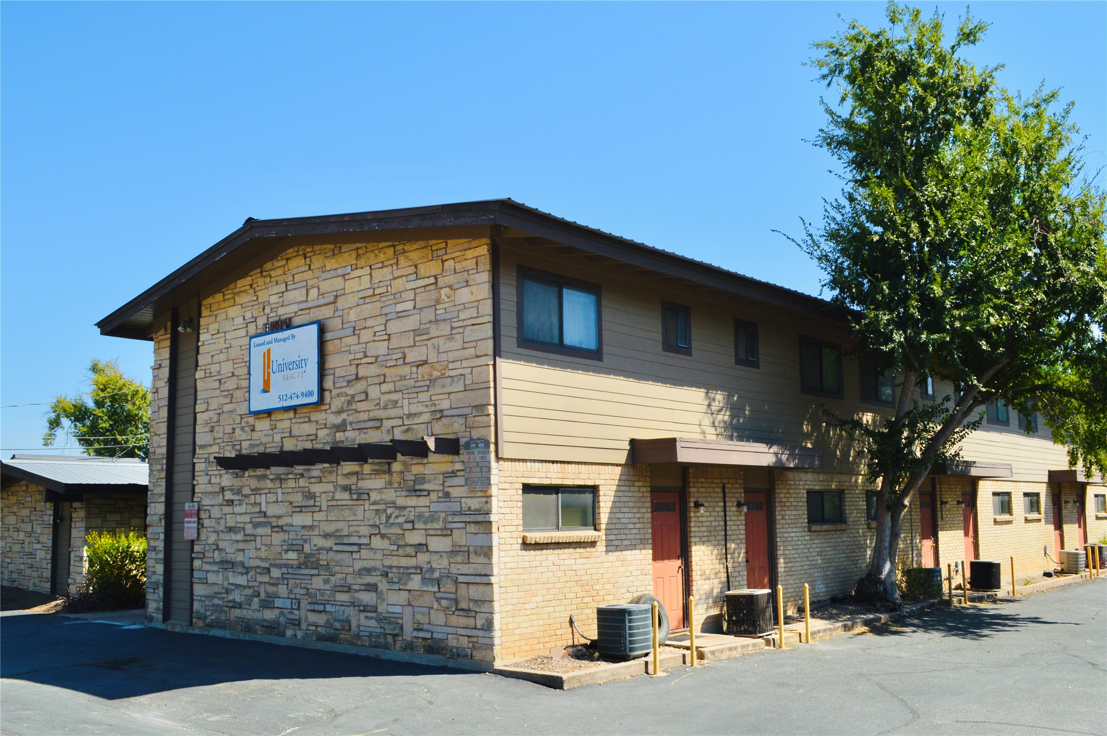 View of front facade featuring stone siding