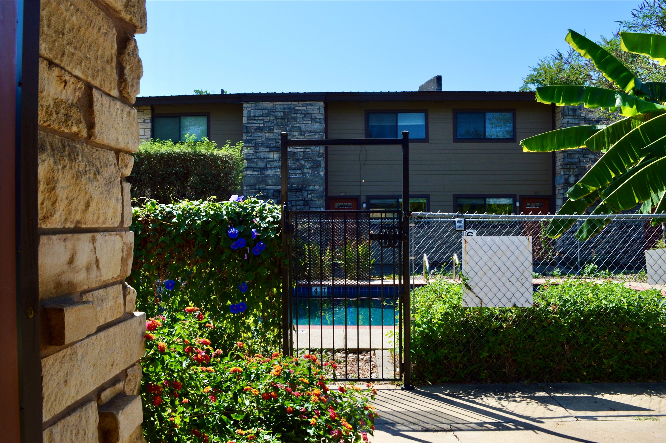 5001 Bull Creek Road, Unit 117 Austin, TX 78731 - Photo 10 of 10 View of pool with a gate
