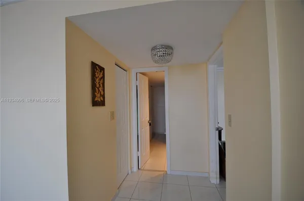 a view of a hallway with elevator