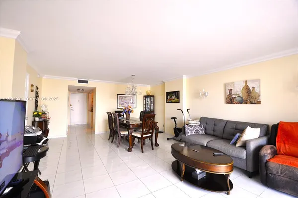 a living room with furniture and a couch