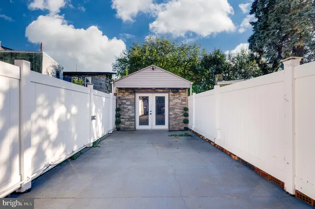 a view of a back yard of the house