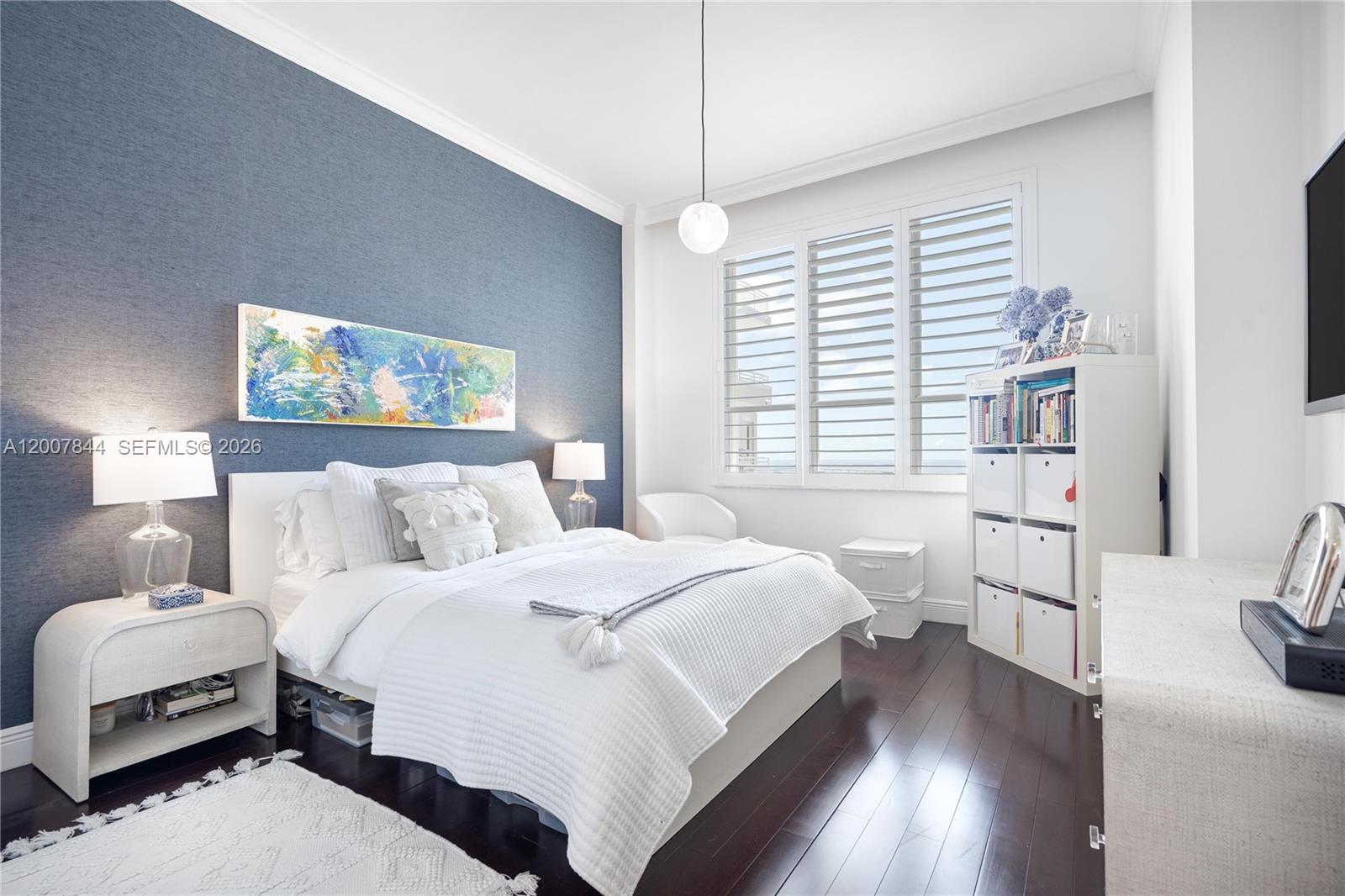 888 Brickell Key Drive, Unit 2602 Miami, FL 33131 - Photo 19 of 29 a bedroom with a large bed and a window