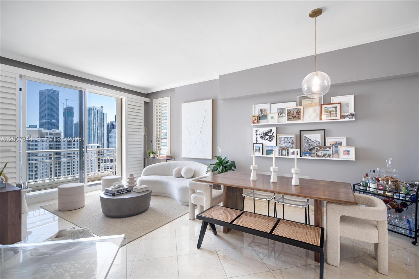 888 Brickell Key Drive, Unit 2602 Miami, FL 33131 - Photo 3 of 29 a living room with furniture