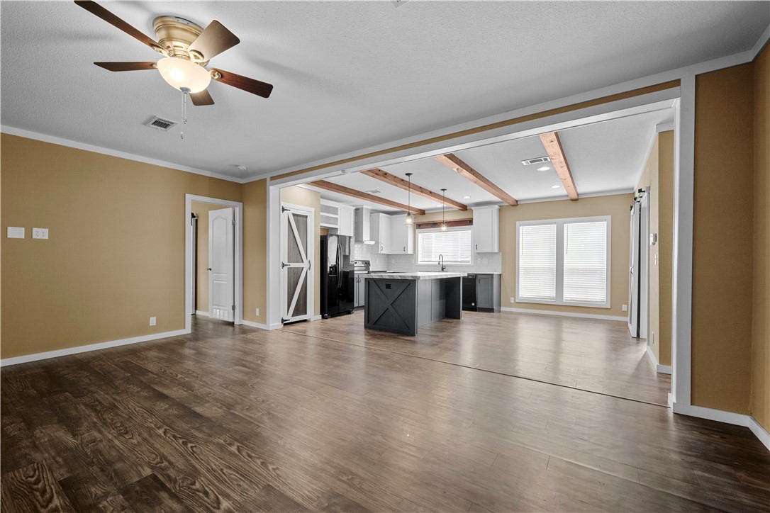 1511 Monkey Road Rockport, TX 78382 - Photo 11 of 40 a view interior of a house an entryway and fire place