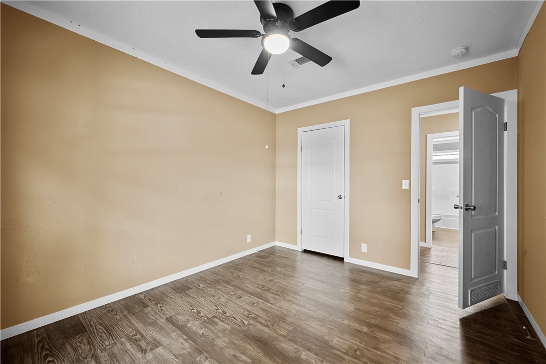 1511 Monkey Road Rockport, TX 78382 - Photo 28 of 40 wooden floor in an empty room