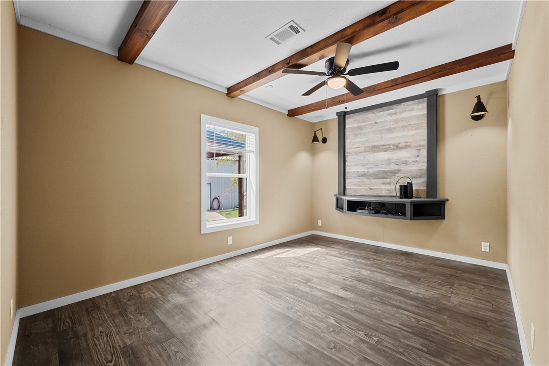 1511 Monkey Road Rockport, TX 78382 - Photo 31 of 40 an empty room with windows