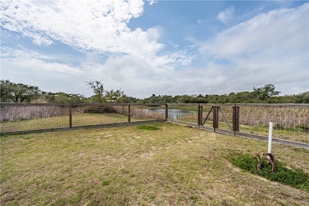1511 Monkey Road Rockport, TX 78382 - Photo 36 of 40 a view of a lake with houses in the back