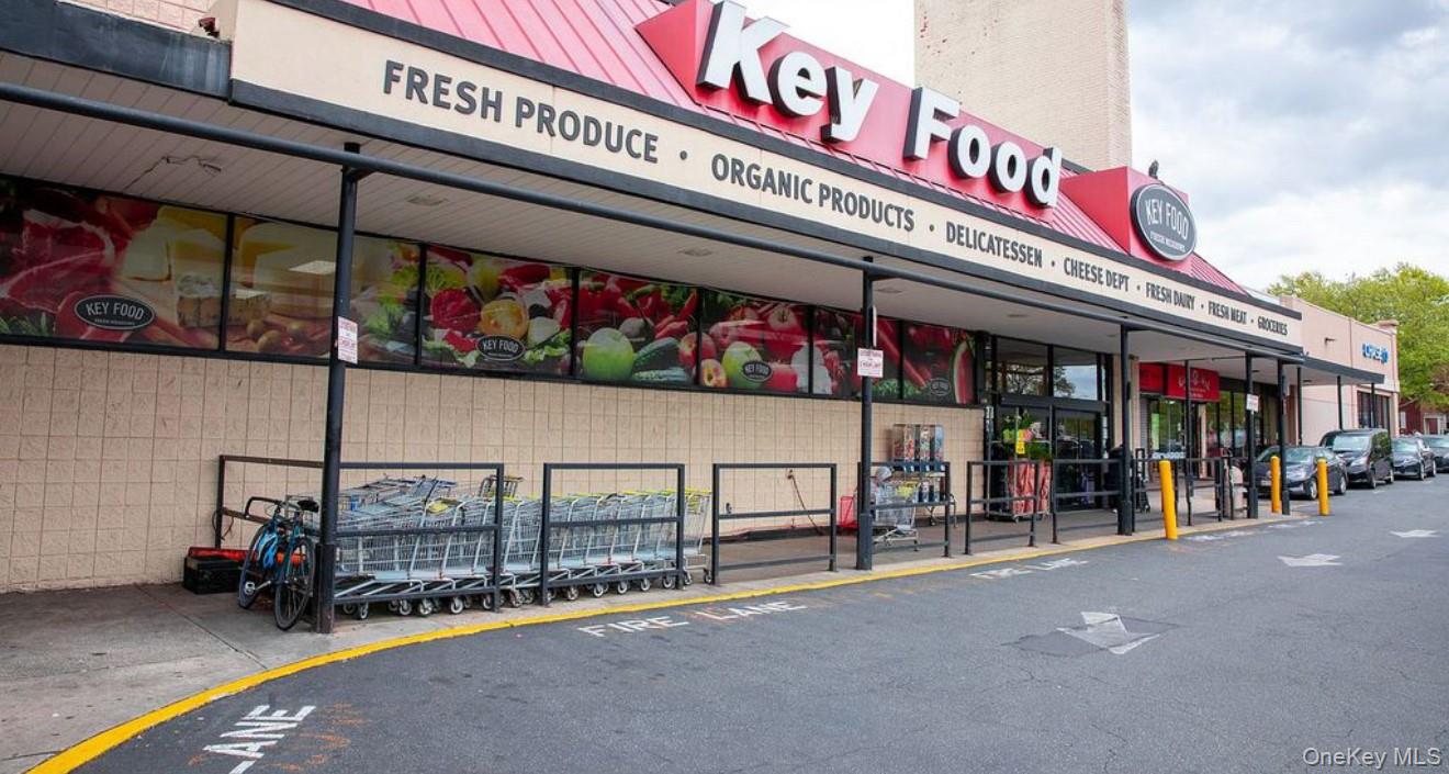 141-39 79th Avenue, Unit 3O Queens, NY 11367 - Photo 9 of 10 a view of a cafe with a lot of signs