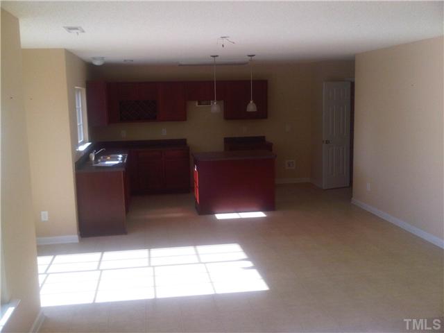 5806 Parkchester Road Raleigh, NC 27616 - Photo 3 of 3 a view of an empty room with a window
