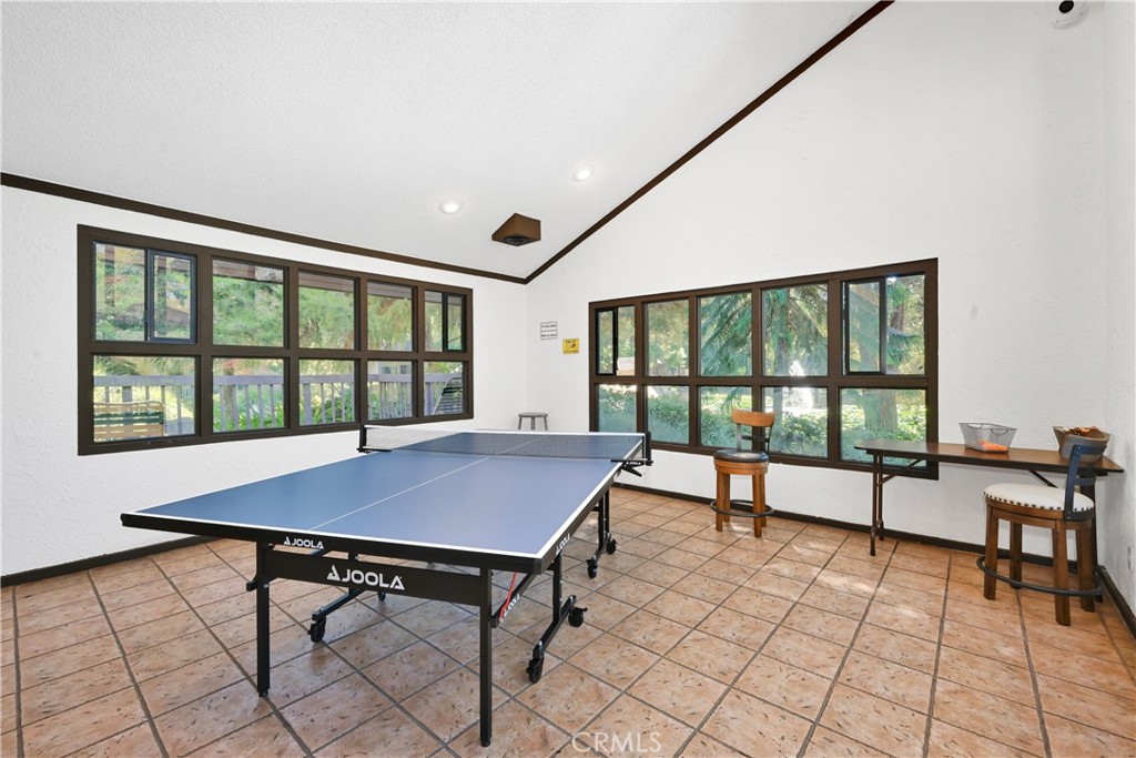 7890 East Spring Street, Unit 2L Long Beach, CA 90815 - Photo 45 of 47 a view of a workspace with furniture and a window