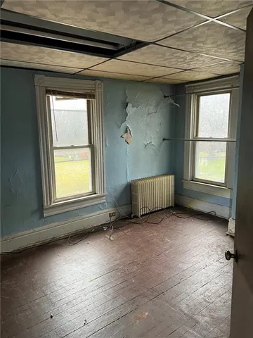 an empty room with windows