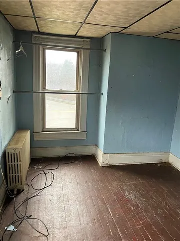 a view of a window in an empty room