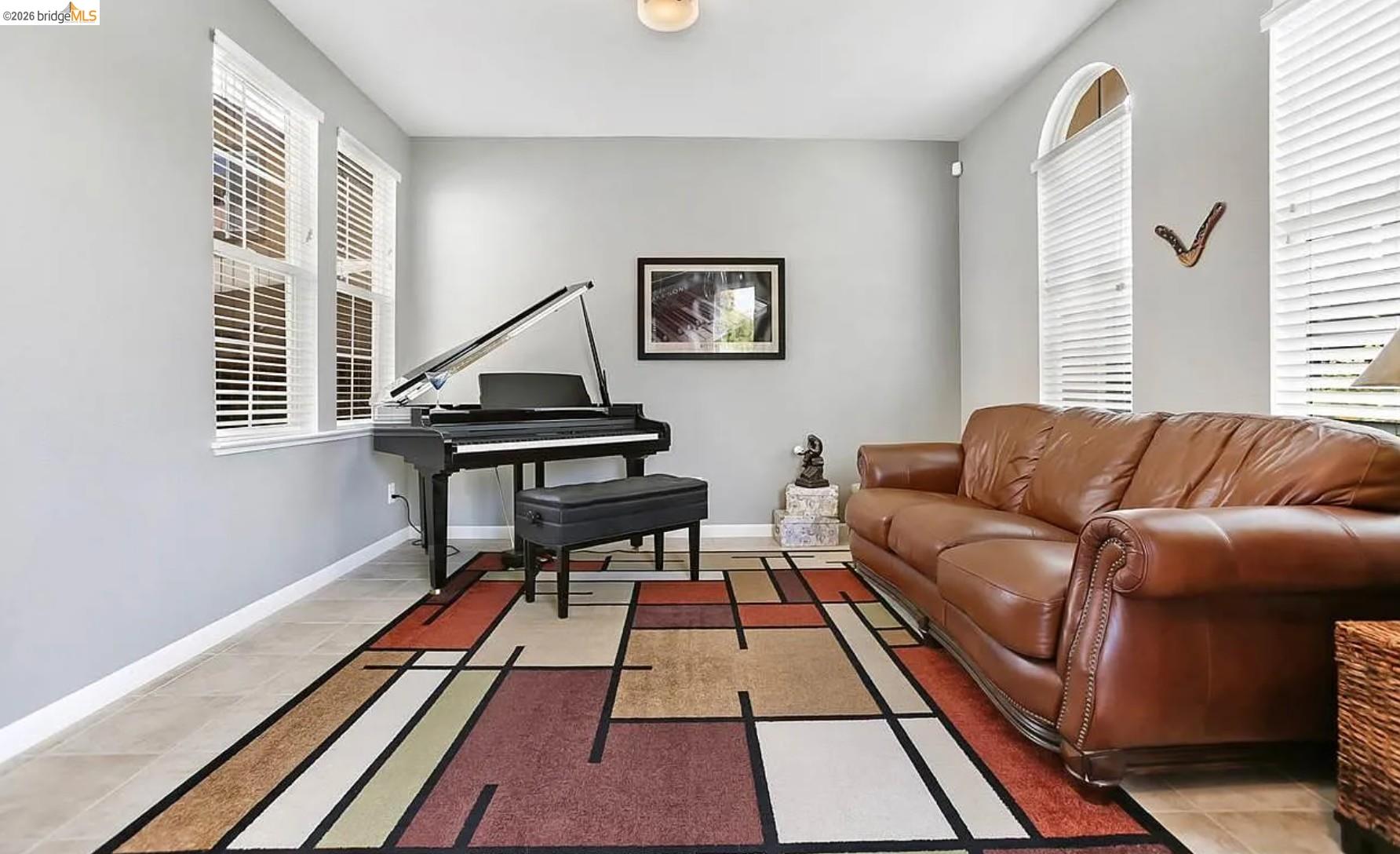 3251 Lookout Point Loop Discovery Bay, CA 94505 - Photo 11 of 31 Sitting room featuring plenty of natural light and light tile patterned floors