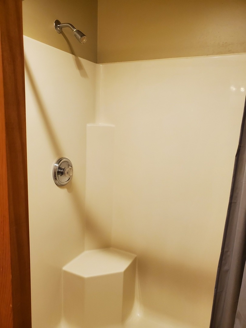 325 South Clark Street, Unit 2C Utica, IL 61373 - Photo 17 of 22 a bathroom with a shower