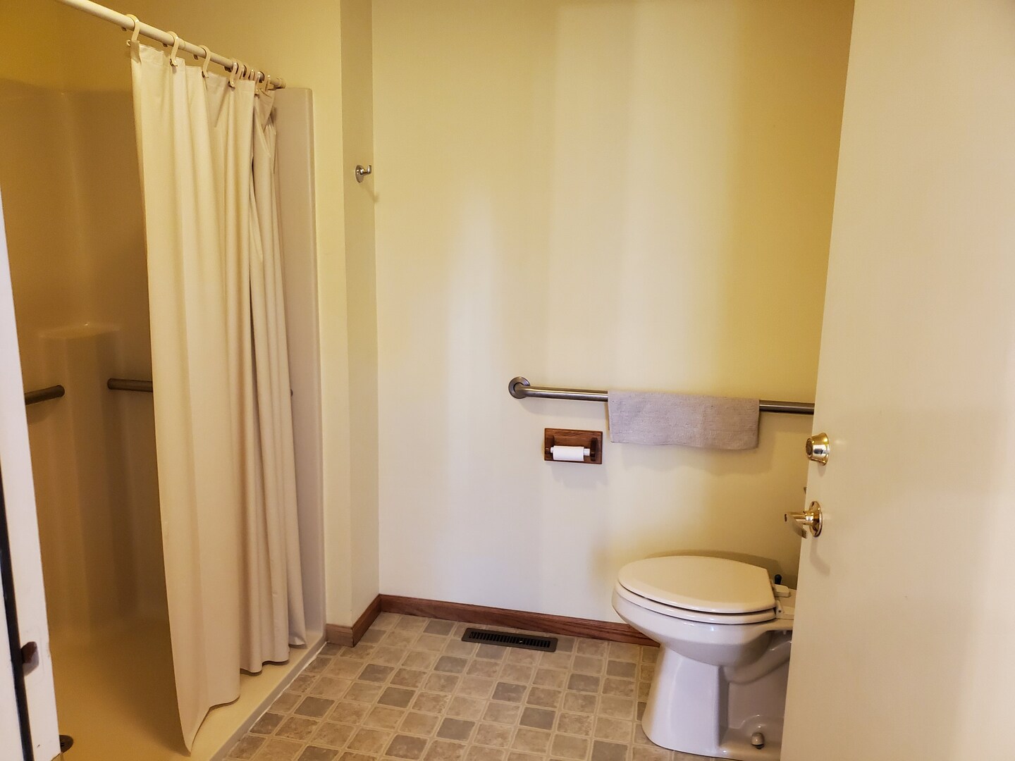 325 South Clark Street, Unit 2C Utica, IL 61373 - Photo 8 of 22 a bathroom with a toilet and a shower