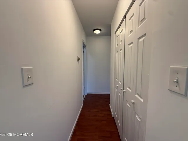 a view of a bathroom from the hallway