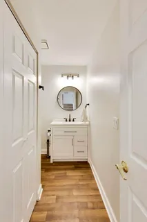 a view of a hallway with washer and dryer