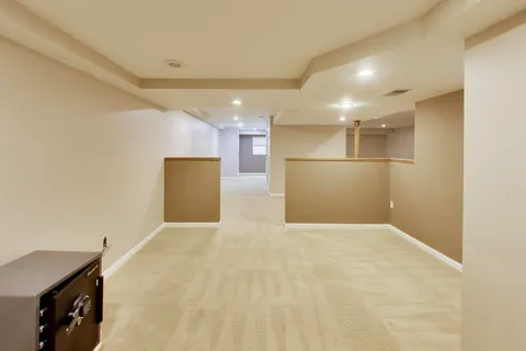 a view of a livingroom with a kitchen