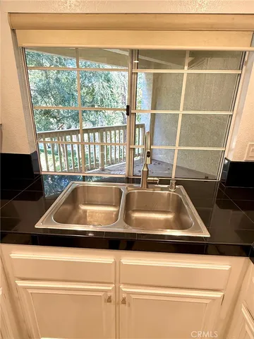 a close view of a microwave and cabinets