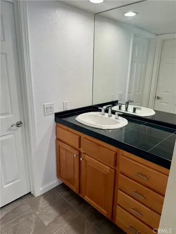 a view of a kitchen from the hallway