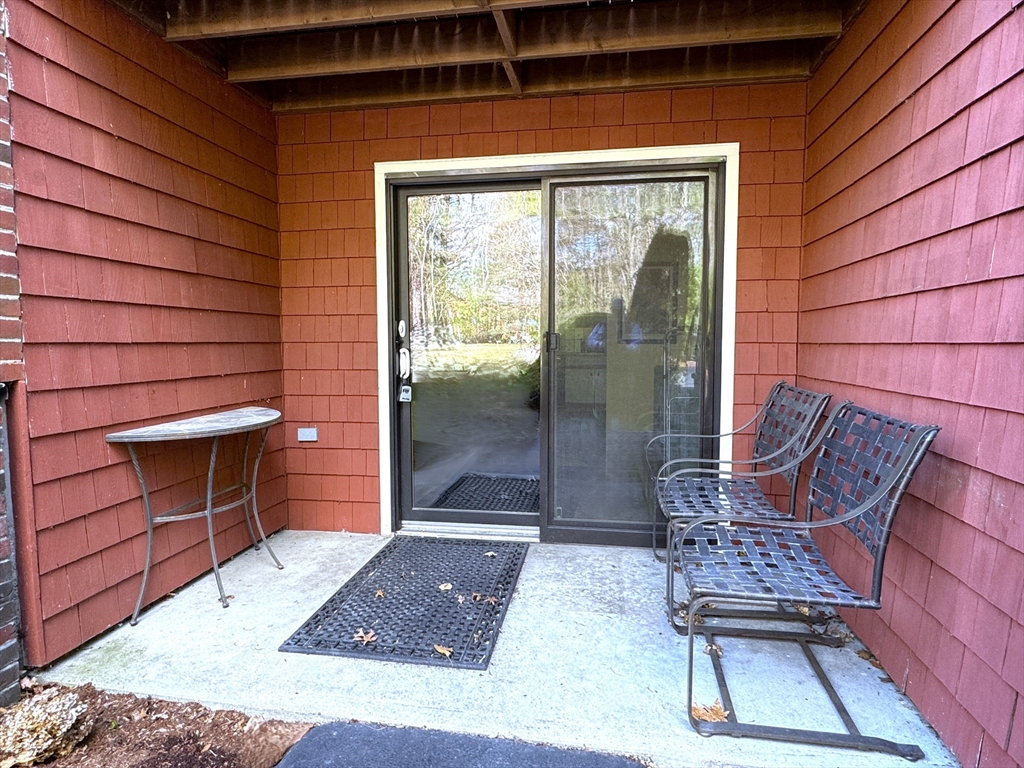 19 Fuller Road, Unit 1 Foxboro, MA 02035 - Photo 3 of 18 a view of a two chairs in the patio