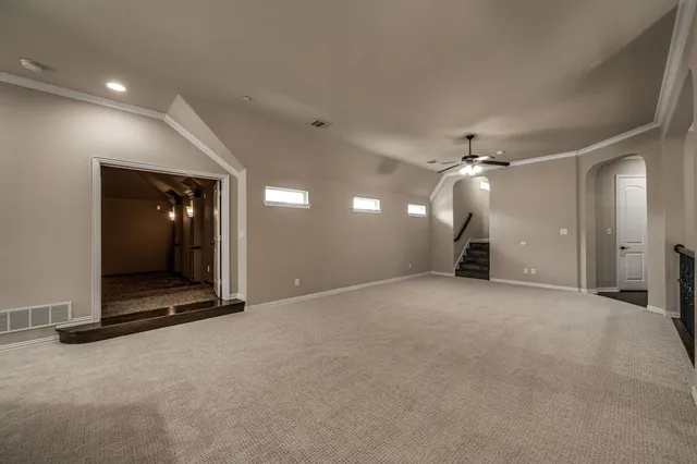 a view of a livingroom with a staircase