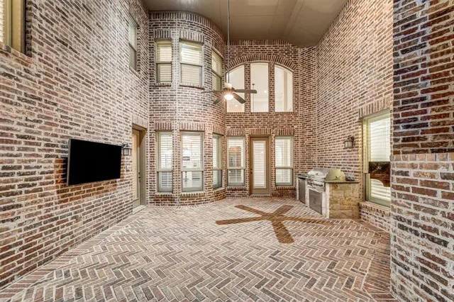 a building exterior with furniture