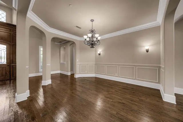 a view of a livingroom with wooden floor