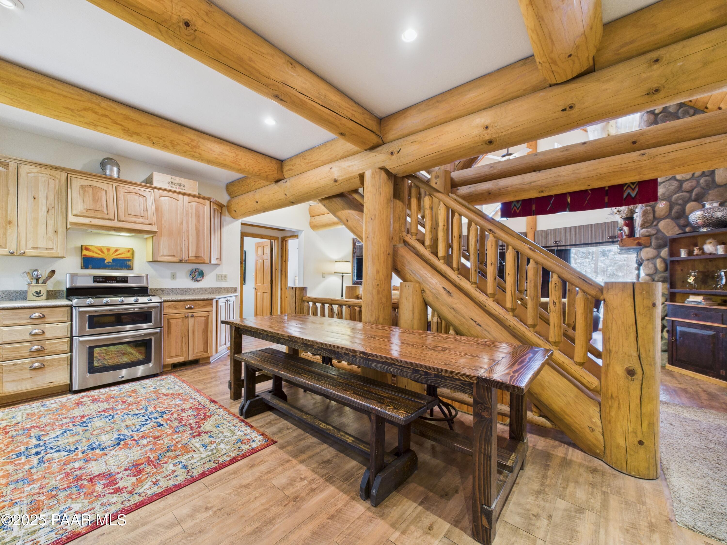 835 Happy Valley Road Prescott, AZ 86305 - Photo 15 of 61 a kitchen with wooden cabinets and stainless steel appliances