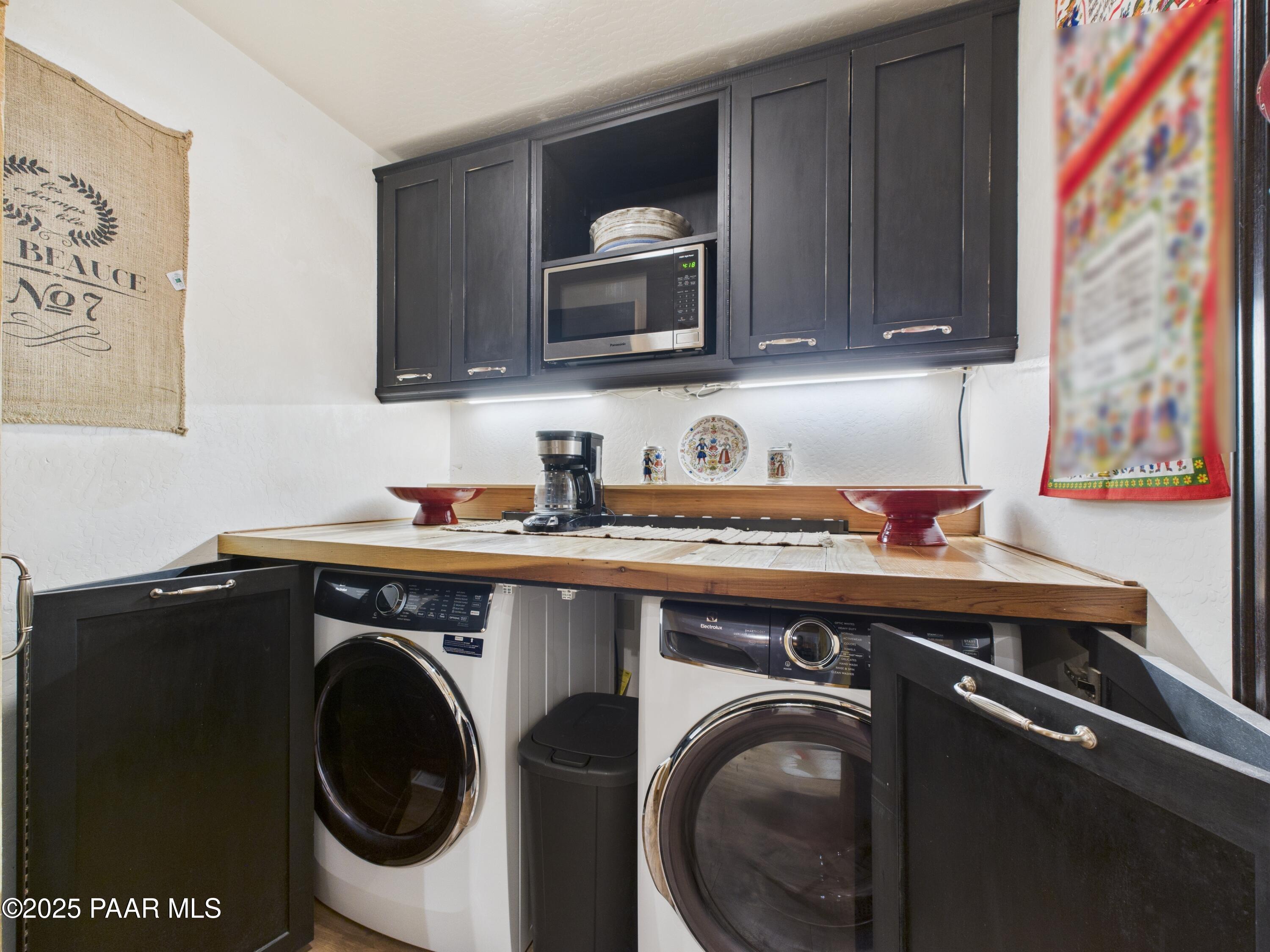 835 Happy Valley Road Prescott, AZ 86305 - Photo 17 of 61 a utility room with sink dryer and washer