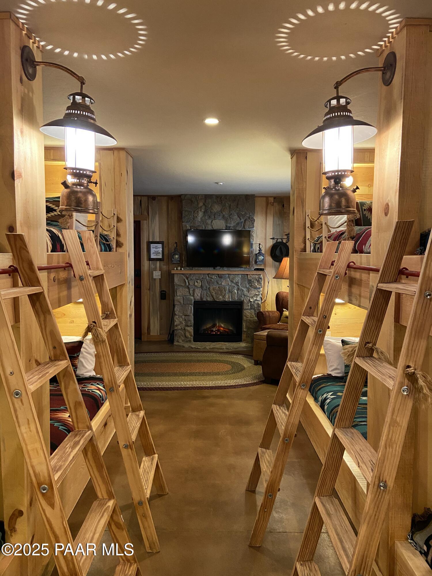 835 Happy Valley Road Prescott, AZ 86305 - Photo 40 of 61 a living room with furniture and a fireplace