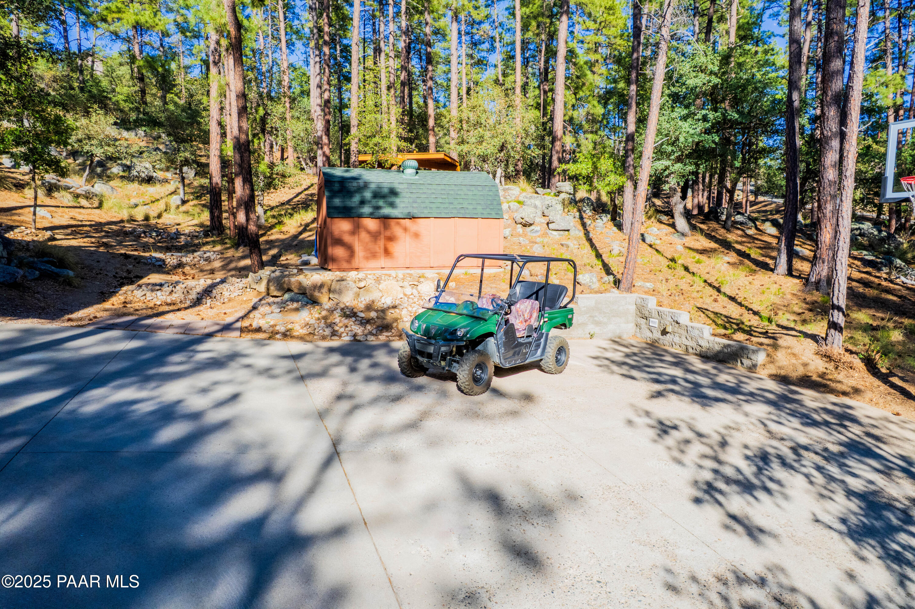 835 Happy Valley Road Prescott, AZ 86305 - Photo 56 of 61 a backyard of a house with table and chairs