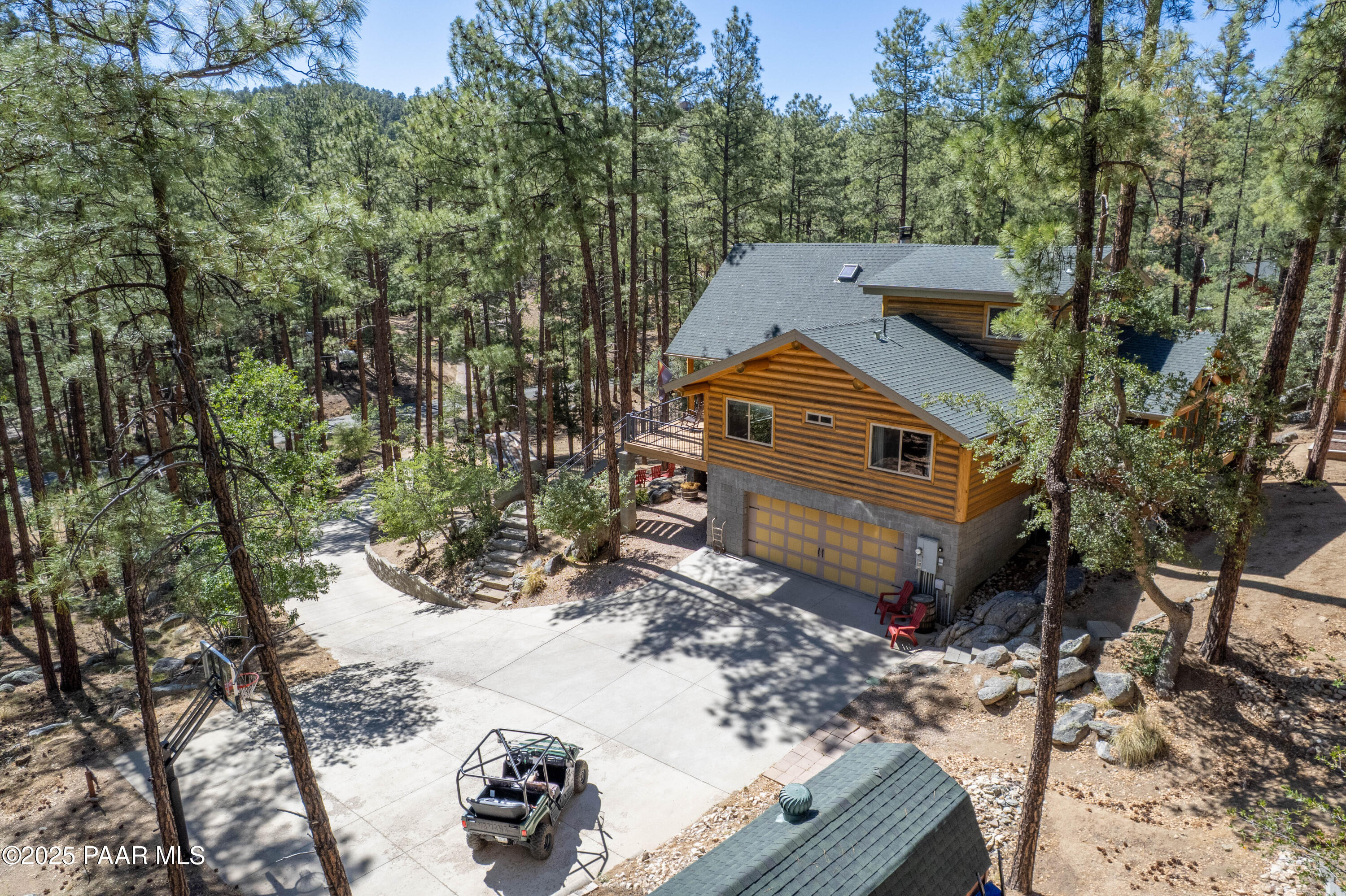 835 Happy Valley Road Prescott, AZ 86305 - Photo 6 of 61 a view of a backyard with a large tree