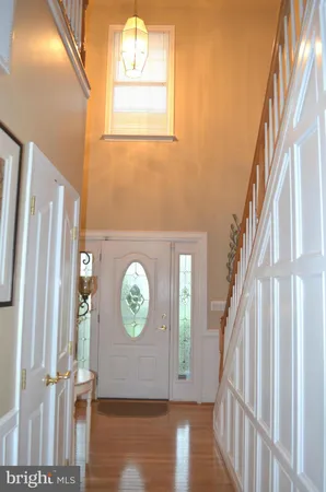 a view of a door with wooden floor
